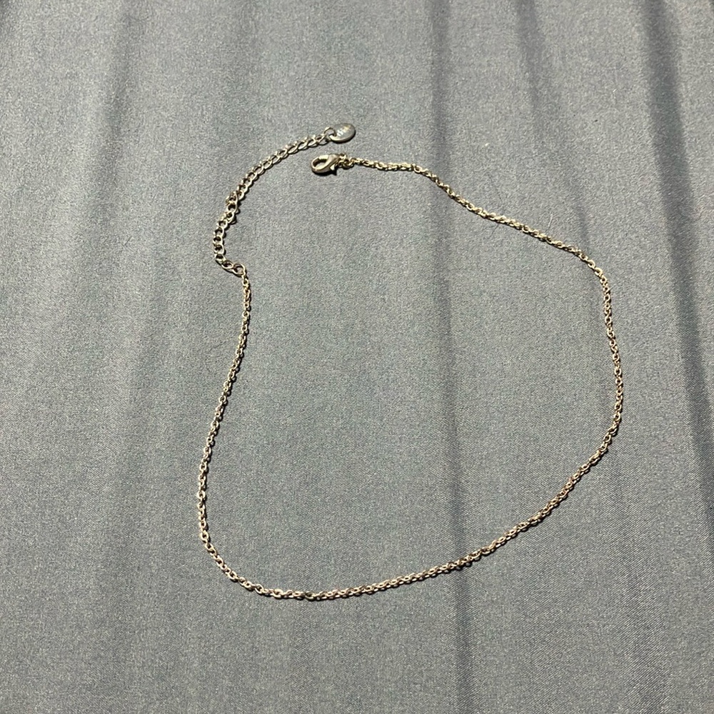 Claire’s silver tone necklace.